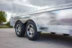 Tandem axle landscape utility trailer viewed from the front right side.