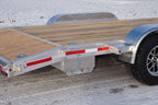 Tandem car hauler with ramp storage compartment closed.